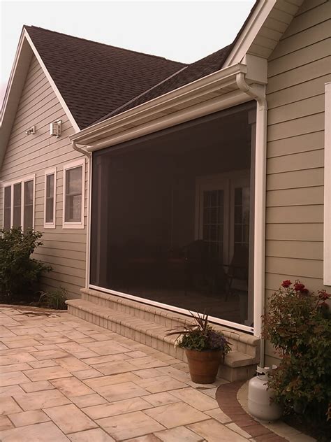 electric back patio enclosure|retractable screens for patios.